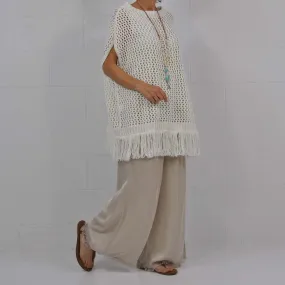 Poncho flecos blanco