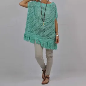 Poncho flecos turquesa